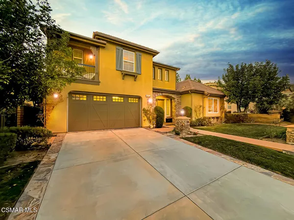 a front view of a building with many windows