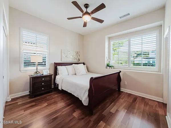 an aerial view of residential houses with outdoor space swimming pool
