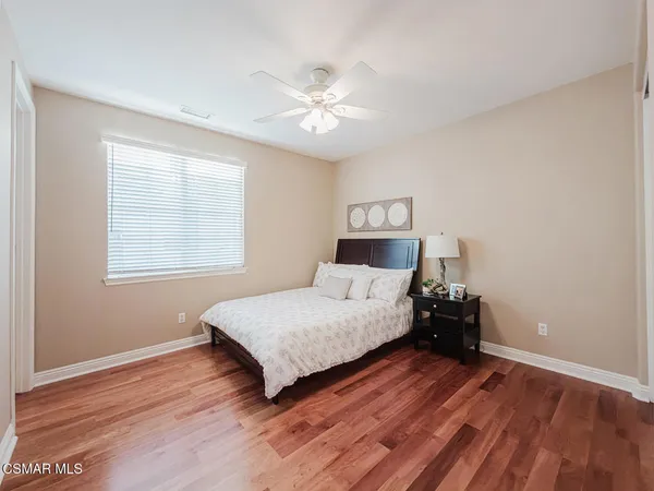a front view of a house with yard porch and garage