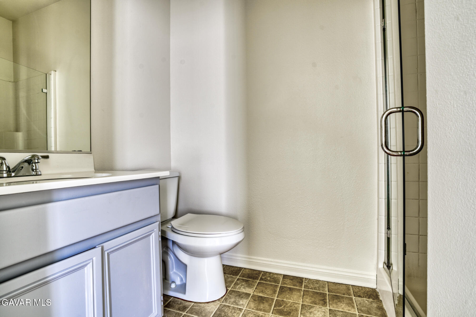 37928 Pisces Circle Palmdale, CA 93552 - Photo 29 of 32 a bathroom with a sink toilet and shower
