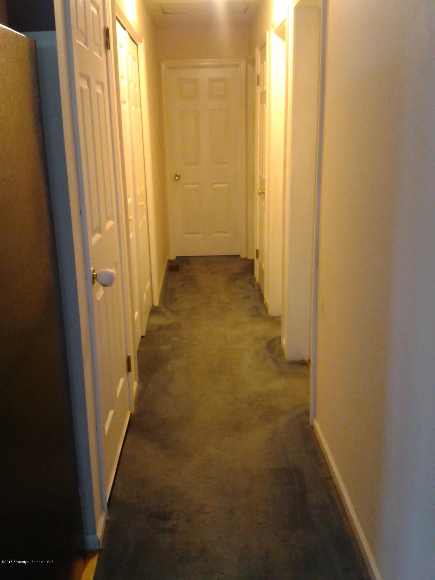 88 Lake Side Road Hop Bottom, PA 18824 - Photo 27 of 40 a view of a hallway with a door