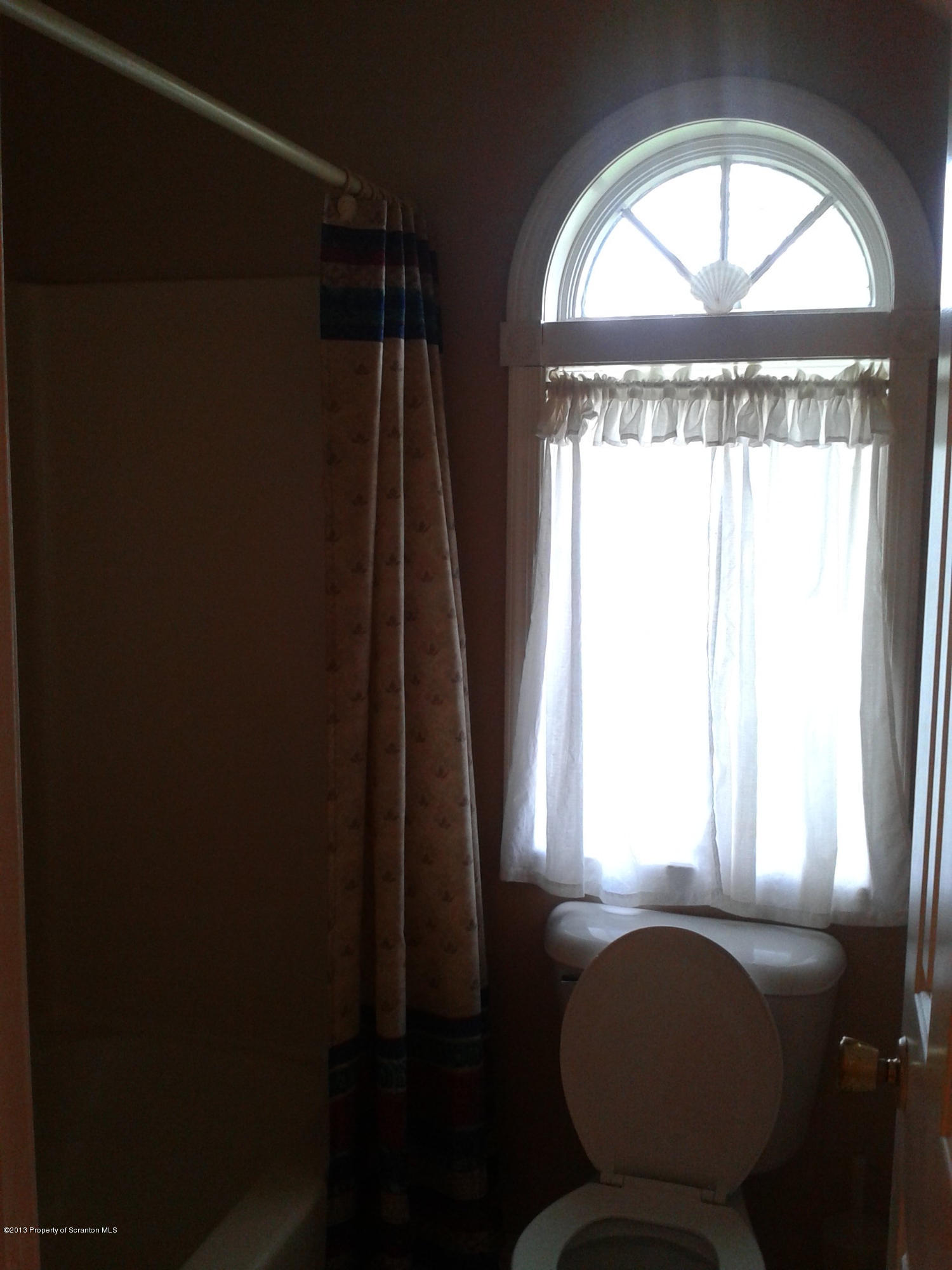 88 Lake Side Road Hop Bottom, PA 18824 - Photo 30 of 40 a room with a window