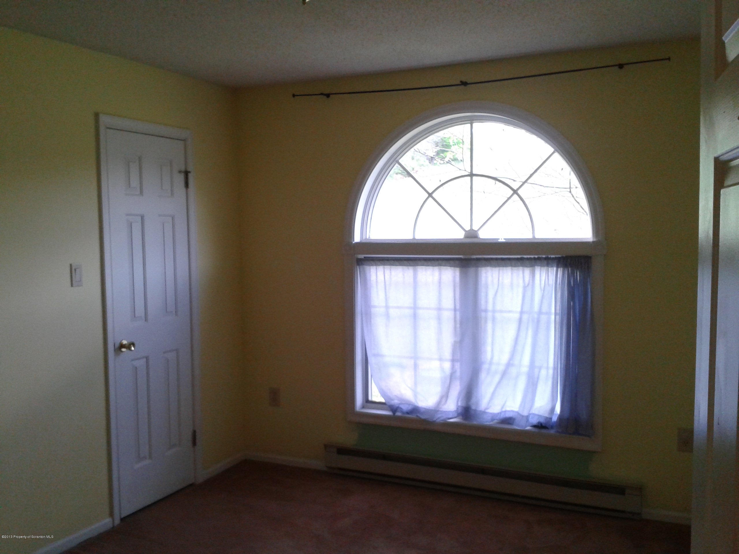 88 Lake Side Road Hop Bottom, PA 18824 - Photo 31 of 40 an empty room that has a window