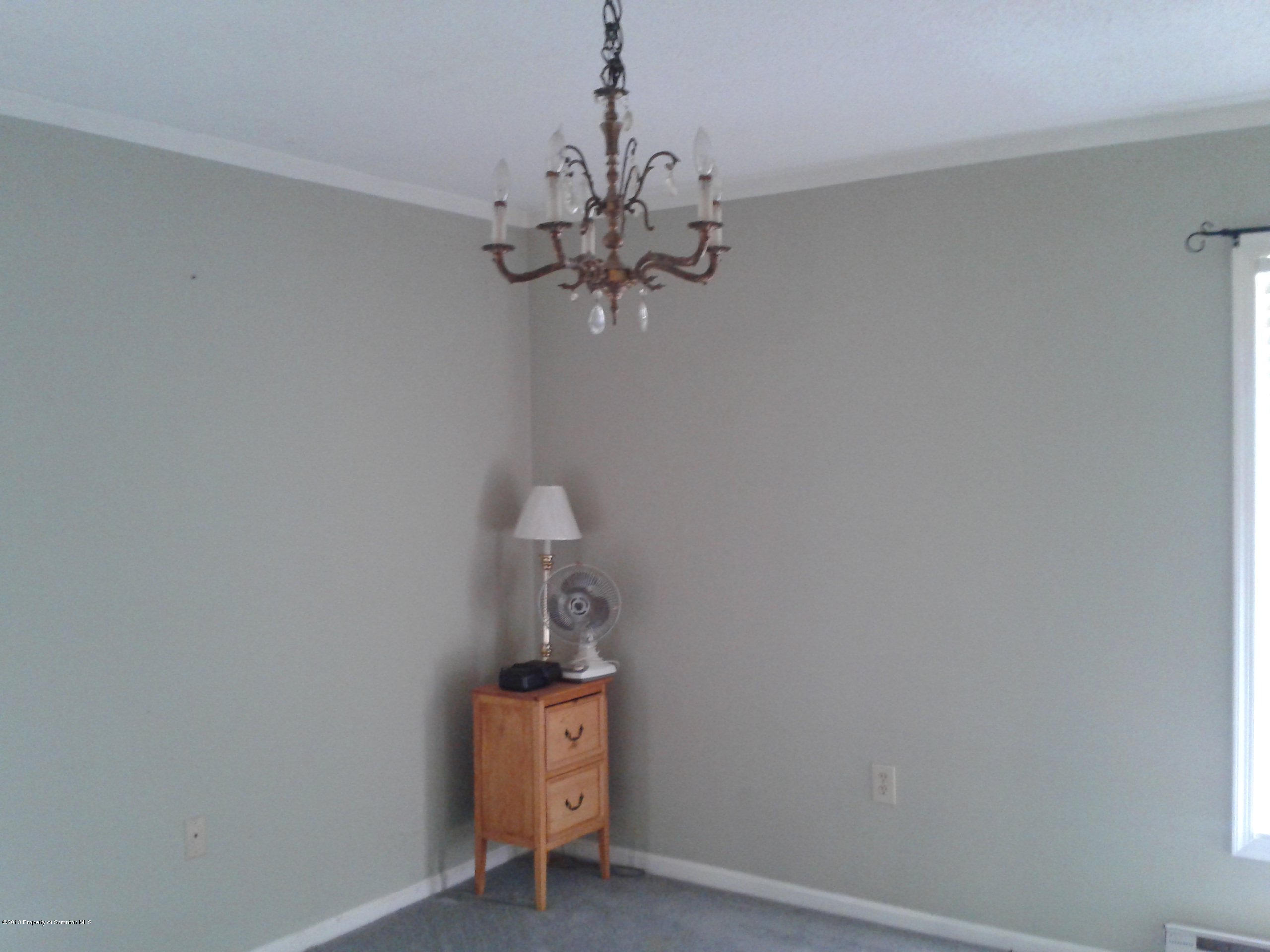 88 Lake Side Road Hop Bottom, PA 18824 - Photo 34 of 40 a view of a room with a hanging light and kitchen