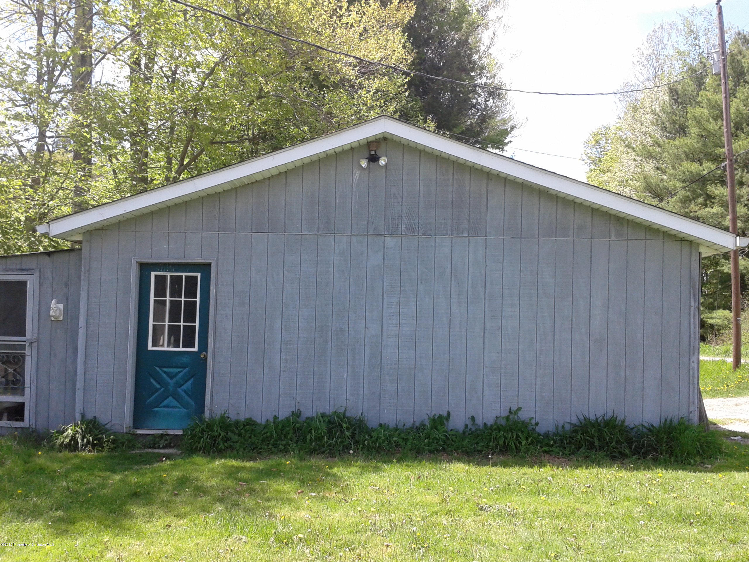 88 Lake Side Road Hop Bottom, PA 18824 - Photo 4 of 40 a backyard of a house