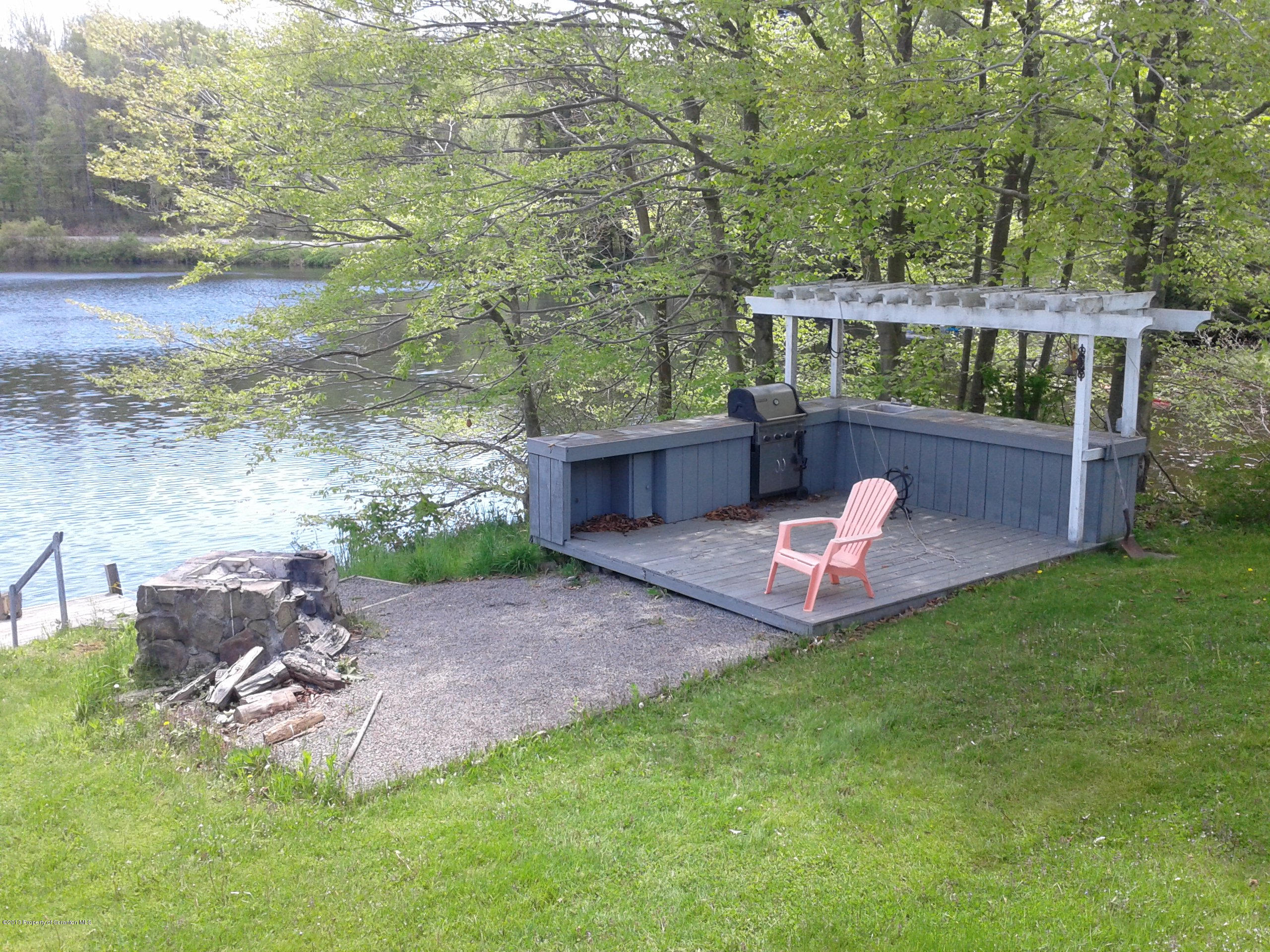 88 Lake Side Road Hop Bottom, PA 18824 - Photo 10 of 40 a garden view with a seating space