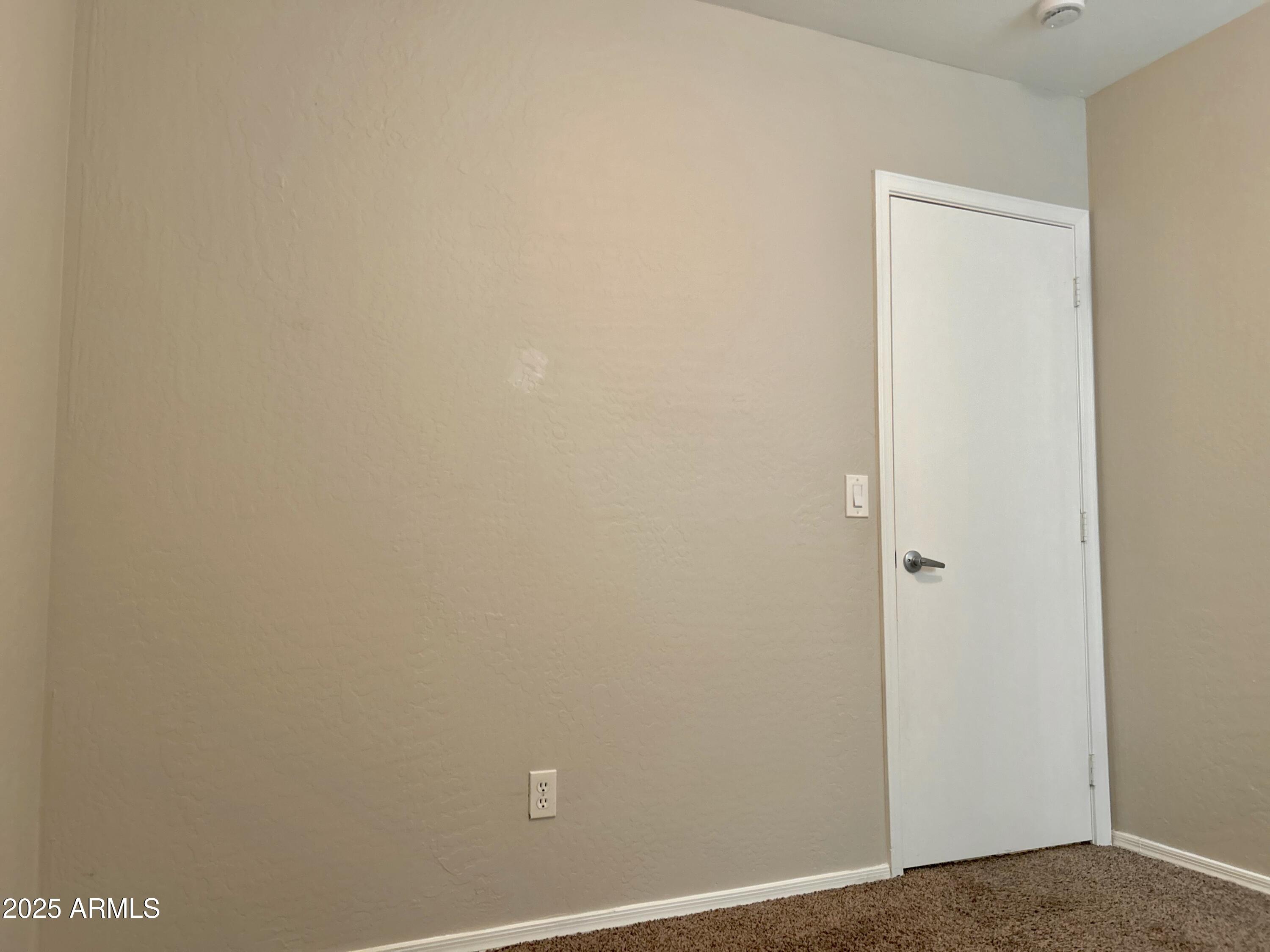 4423 East McLellan Road, Unit 115 Mesa, AZ 85205 - Photo 12 of 16 a view of an empty room