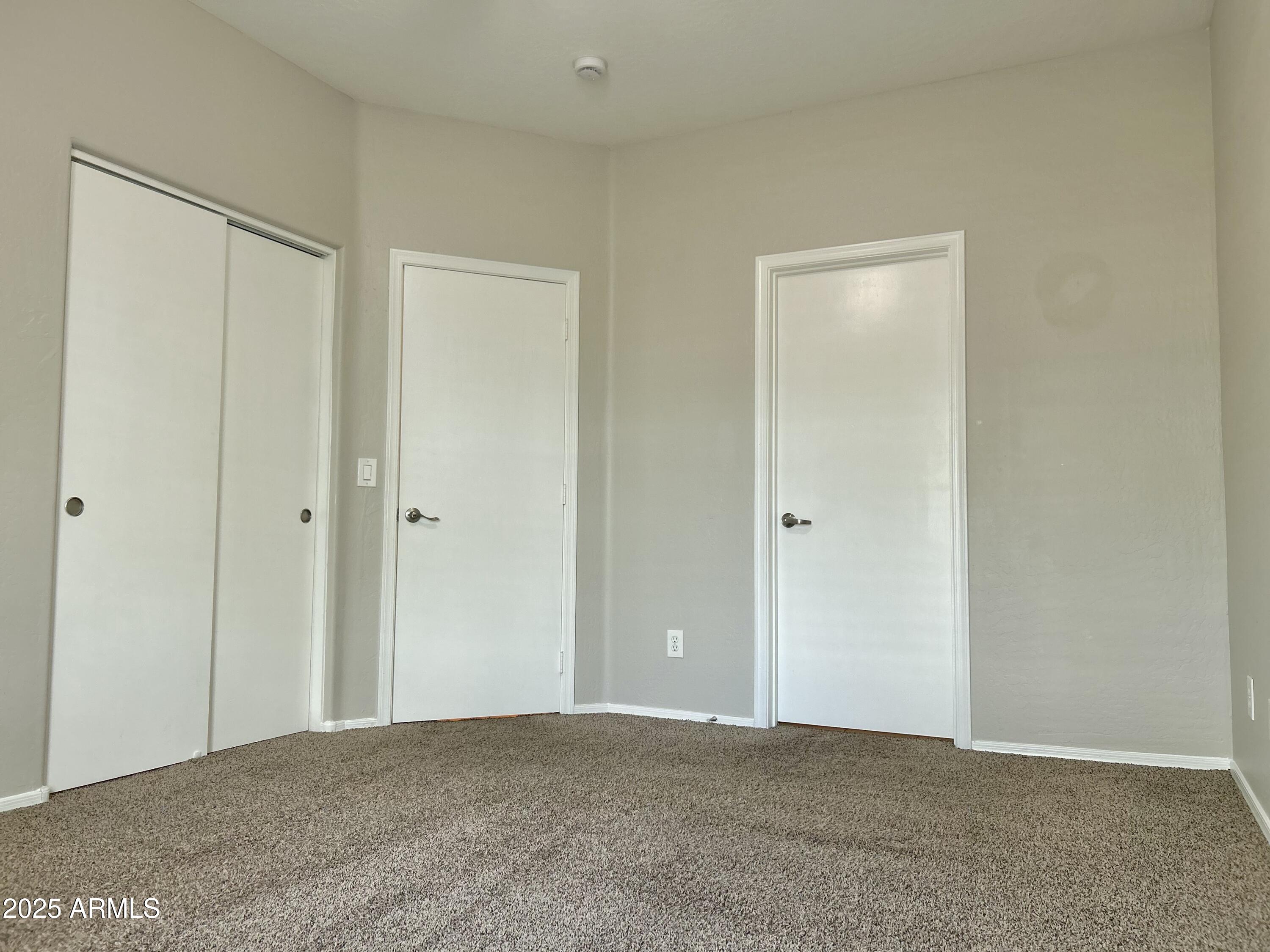 4423 East McLellan Road, Unit 115 Mesa, AZ 85205 - Photo 9 of 16 a view of an empty room