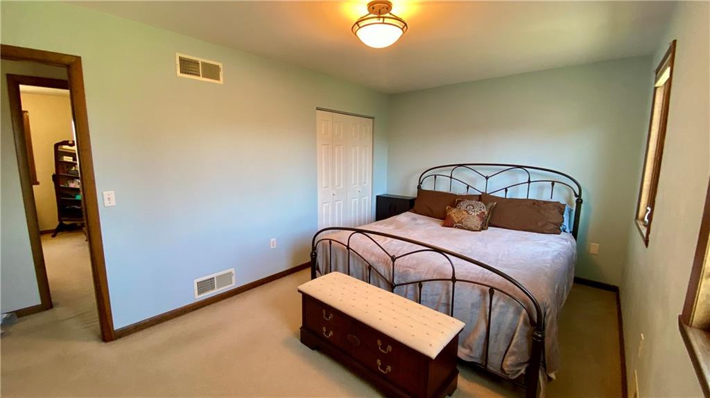 200 Porter Street Springdale, PA 15144 - Photo 11 of 35 a bedroom with a bed and window