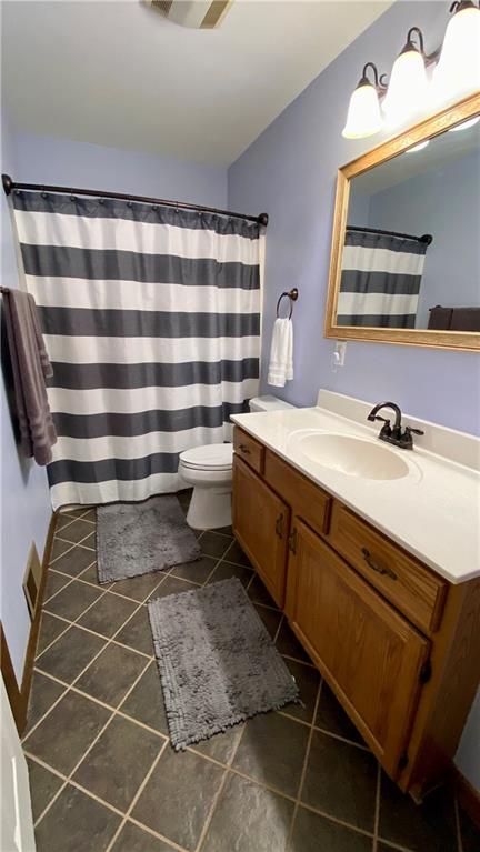 200 Porter Street Springdale, PA 15144 - Photo 16 of 35 a bathroom with a sink and a mirror