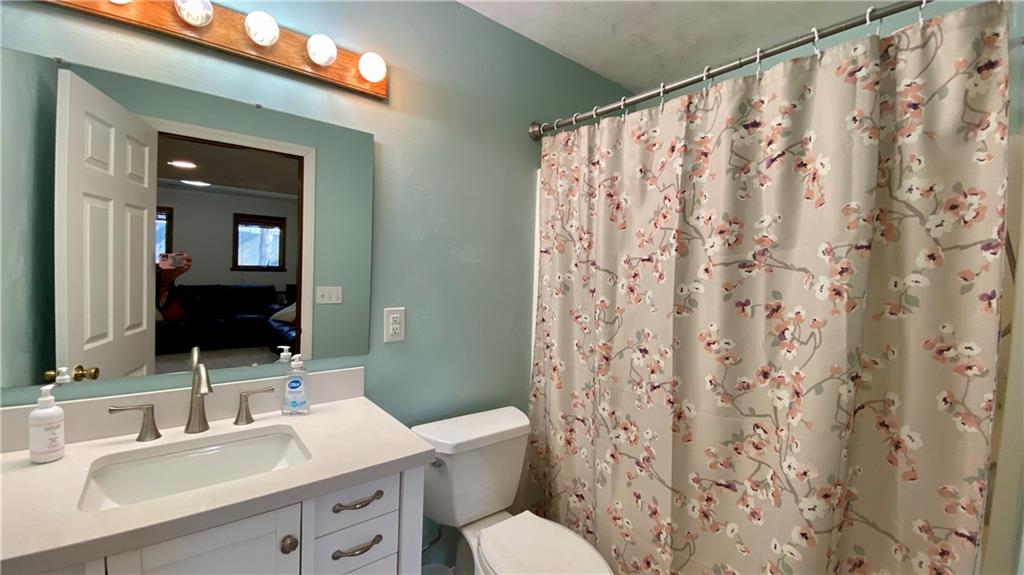 200 Porter Street Springdale, PA 15144 - Photo 17 of 35 a bathroom with a sink and a mirror