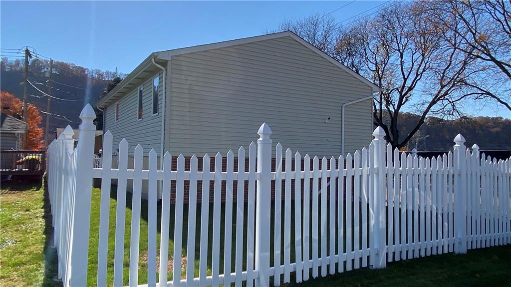 200 Porter Street Springdale, PA 15144 - Photo 34 of 35 a view of a house with wooden fence