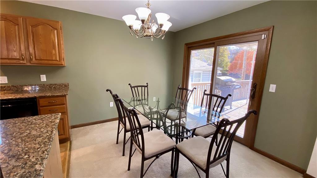 200 Porter Street Springdale, PA 15144 - Photo 5 of 35 a view of a dining room with furniture a chandelier and window