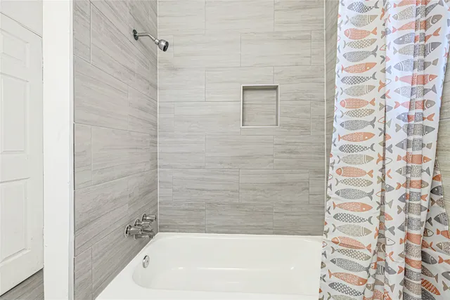 a bathroom with a bathtub