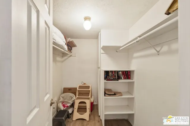 a view of a room with rack and rack on the wall