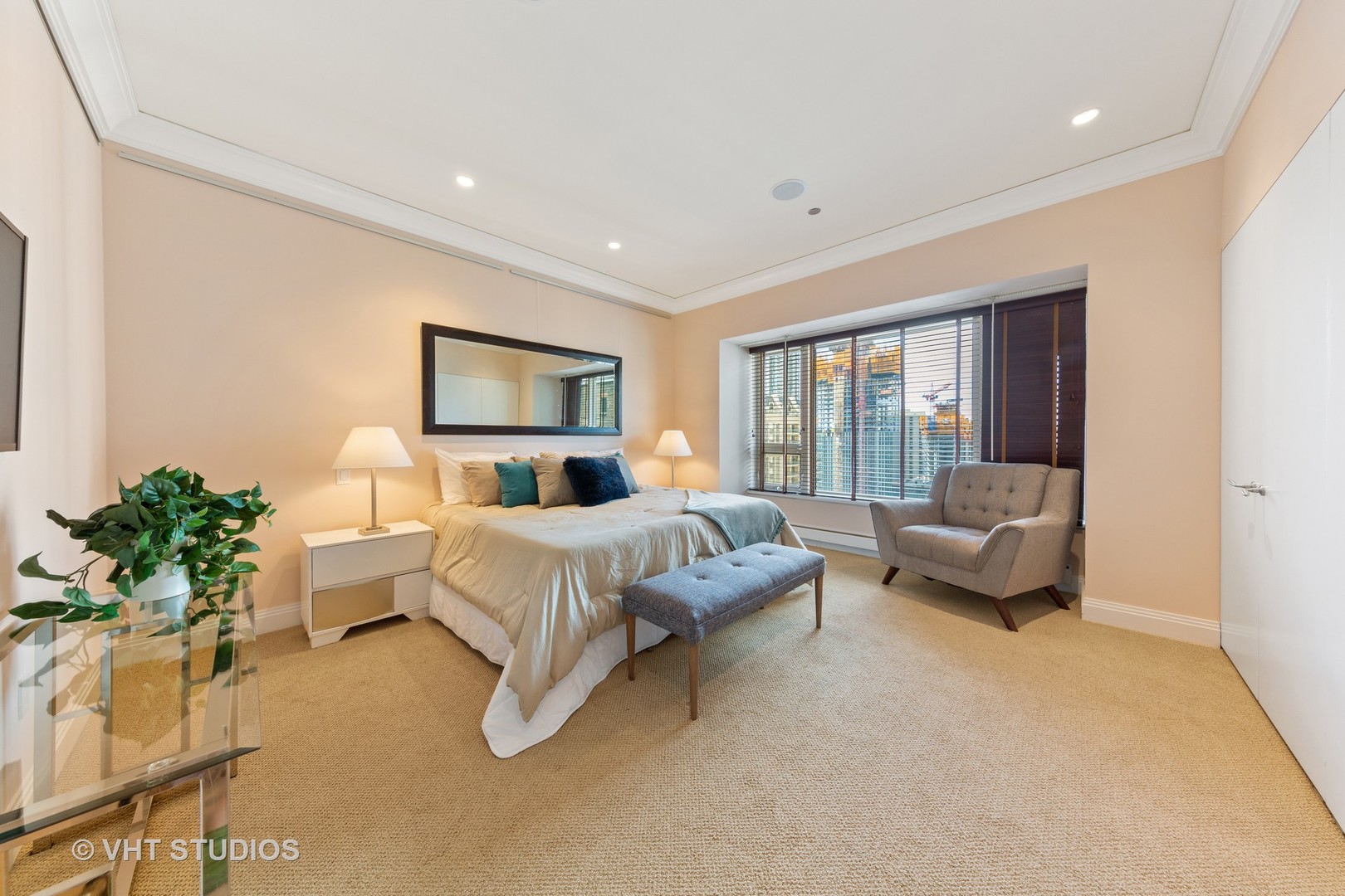 800 North Michigan Avenue, Unit 2003 Chicago, IL 60611 - Photo 14 of 23 a bed room with a bed and a couch