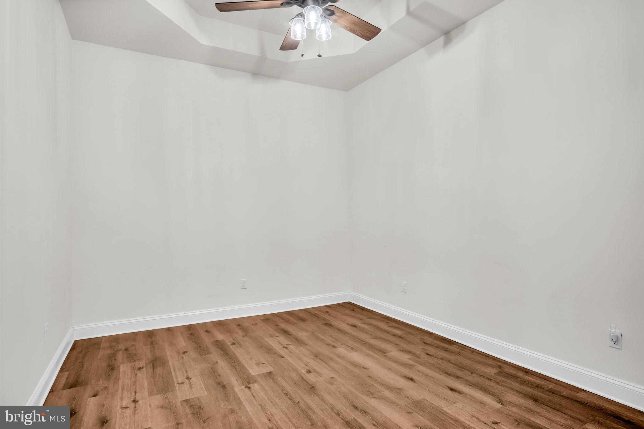 2224 Eastern Boulevard, Unit B York, PA 17402 - Photo 23 of 60 a view of an empty room with wooden floor