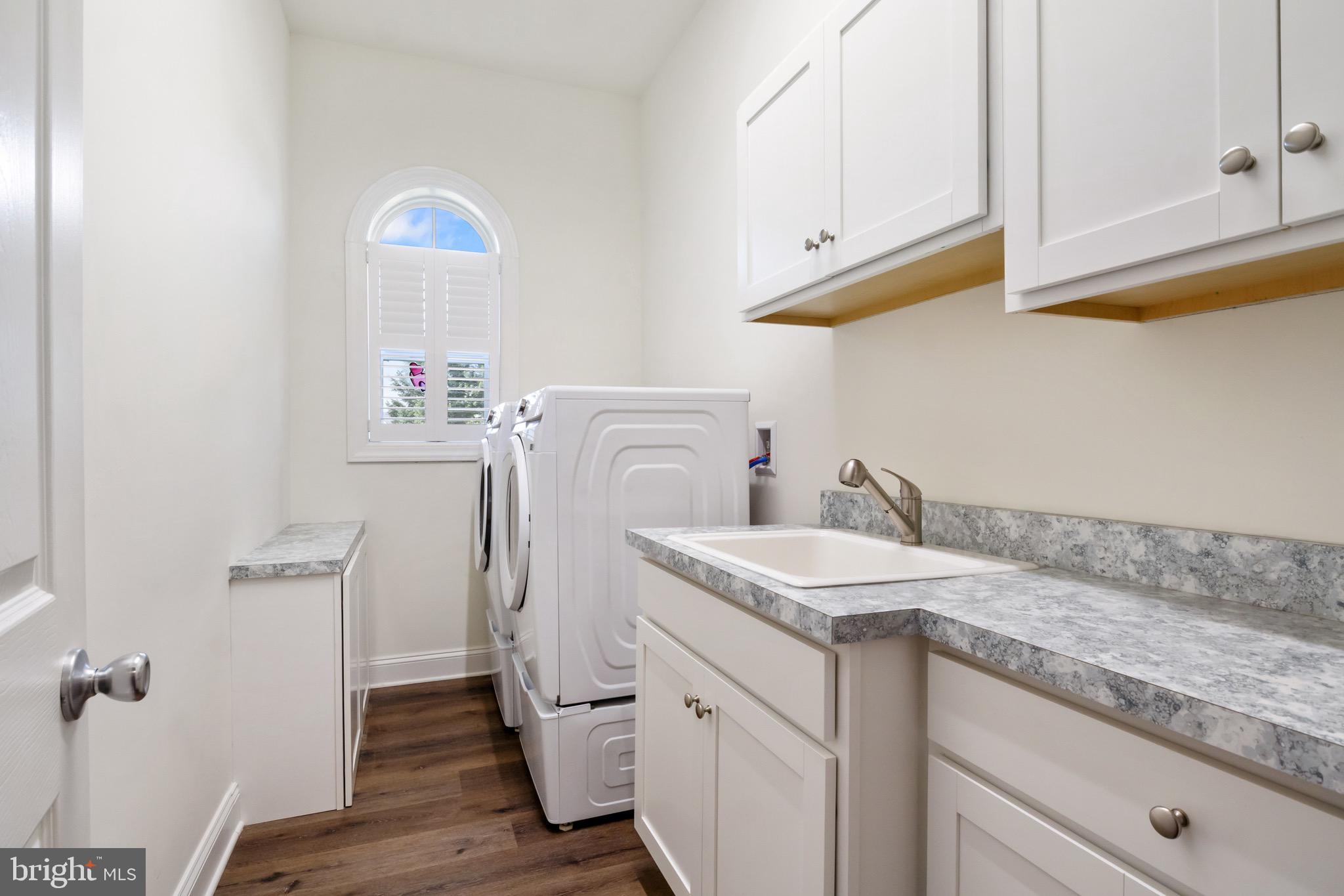2224 Eastern Boulevard, Unit B York, PA 17402 - Photo 40 of 60 a utility room with sink dryer and washer