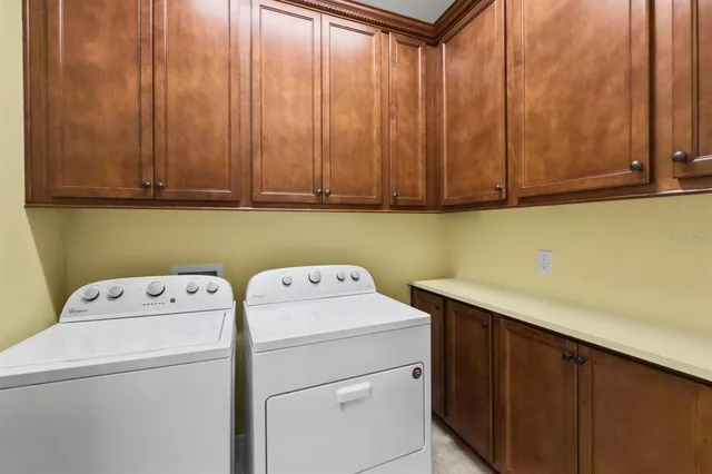 a bedroom with a bed and a table