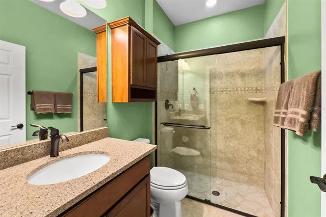 a bedroom with a bed and closet