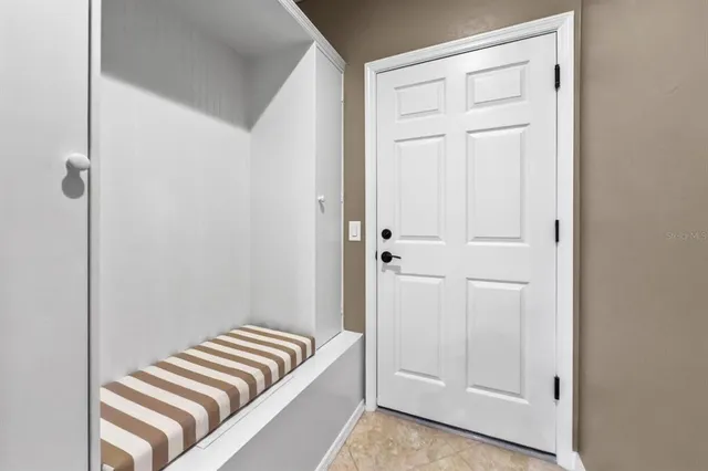 a living room with furniture and a yard