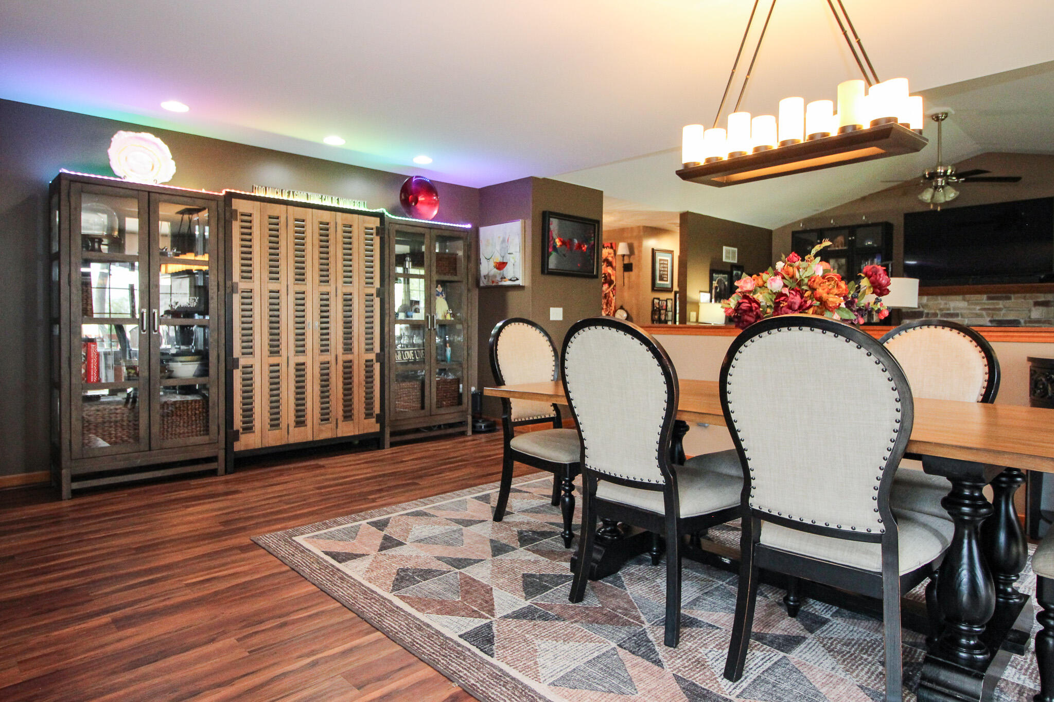 2913 Cardinal Drive Wheatfield, IN 46392 - Photo 15 of 34 a view of a dining room with furniture and chandelier