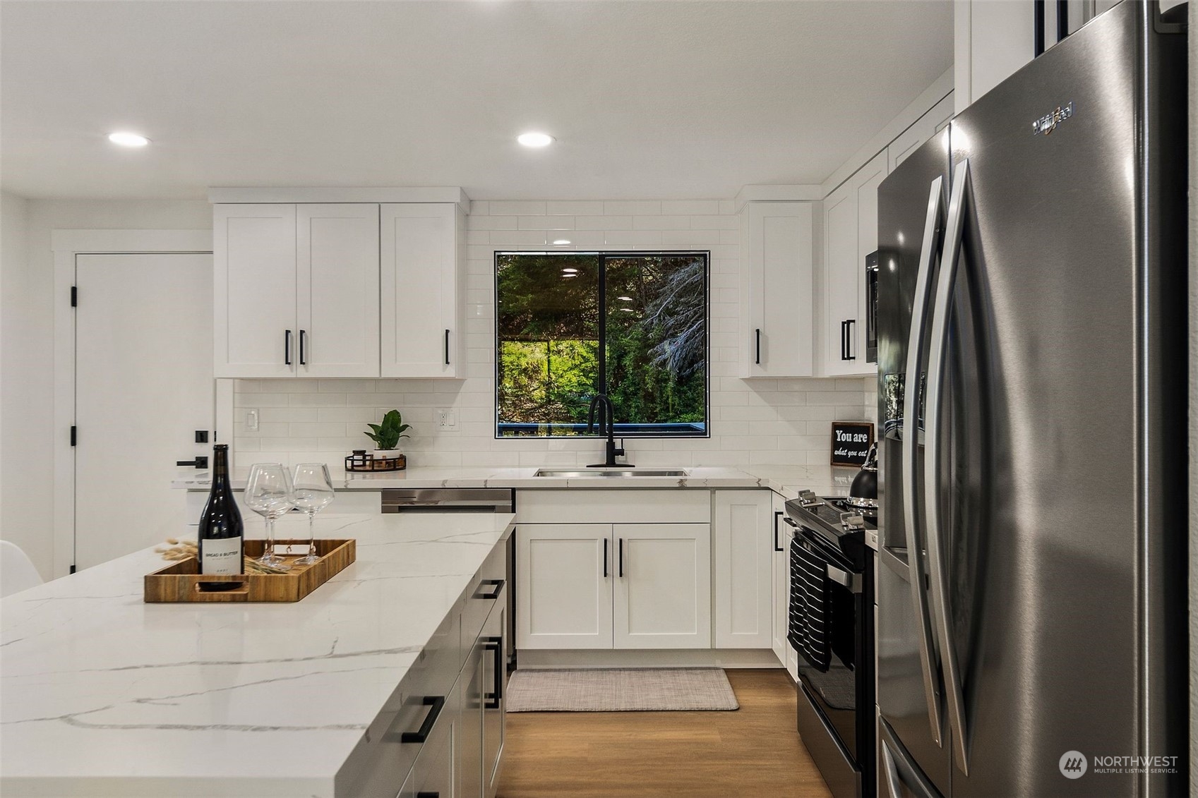 3006 164th Place Southeast Bothell, WA 98012 - Photo 12 of 39 a kitchen with a sink appliances and cabinets