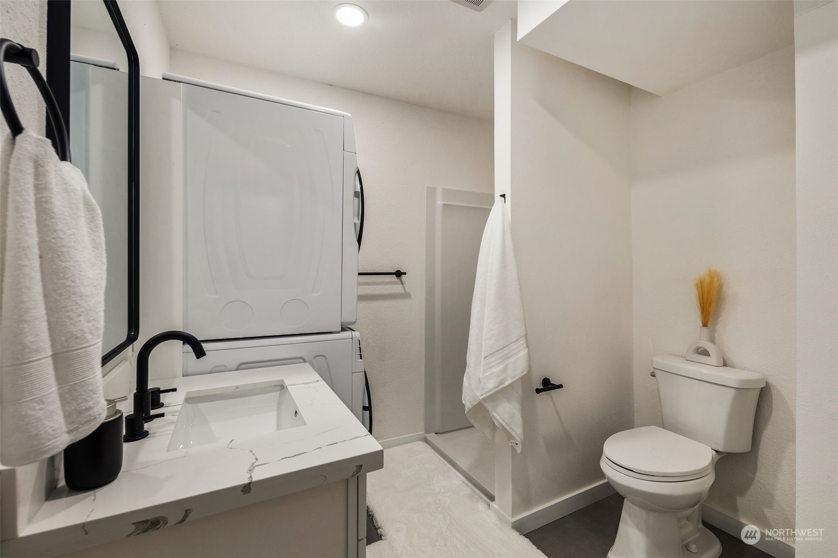 3006 164th Place Southeast Bothell, WA 98012 - Photo 24 of 39 a bathroom with a sink toilet and shower