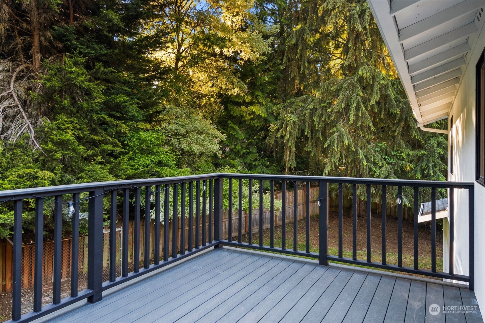 3006 164th Place Southeast Bothell, WA 98012 - Photo 26 of 39 a balcony with wooden floor and fence