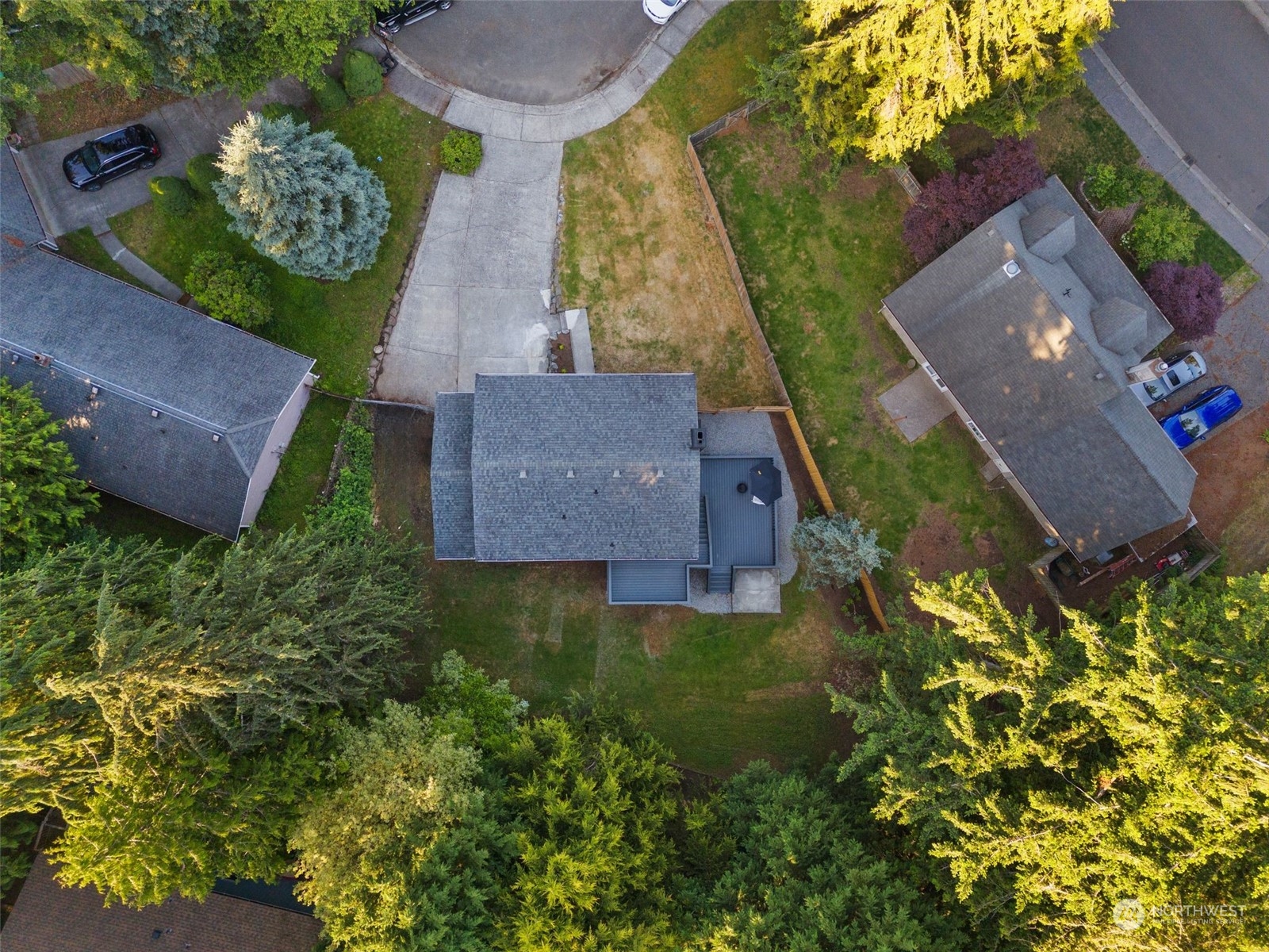 3006 164th Place Southeast Bothell, WA 98012 - Photo 36 of 39 an aerial view of a house with garden space and a lake view