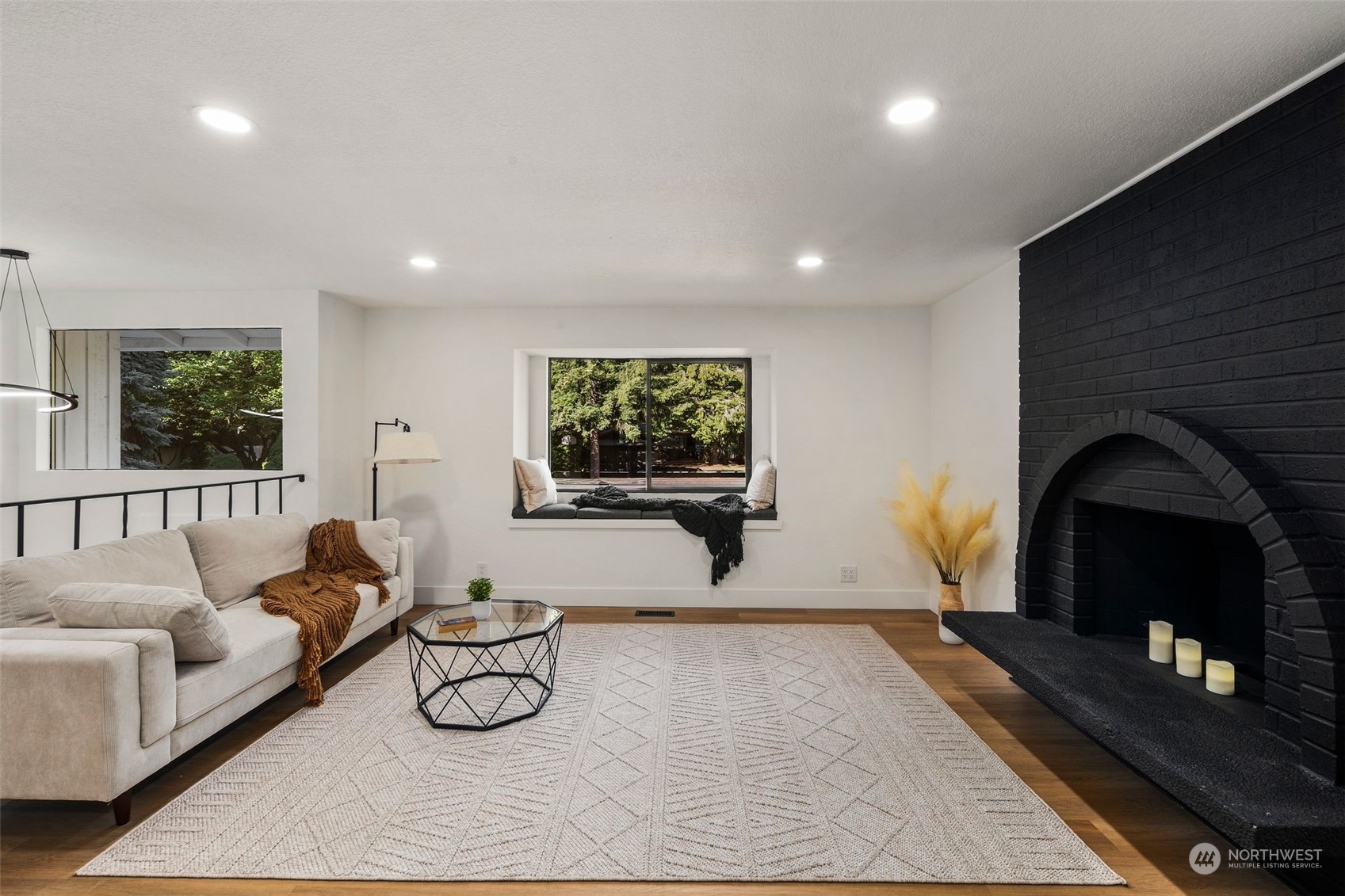 3006 164th Place Southeast Bothell, WA 98012 - Photo 5 of 39 a living room with furniture and a fireplace