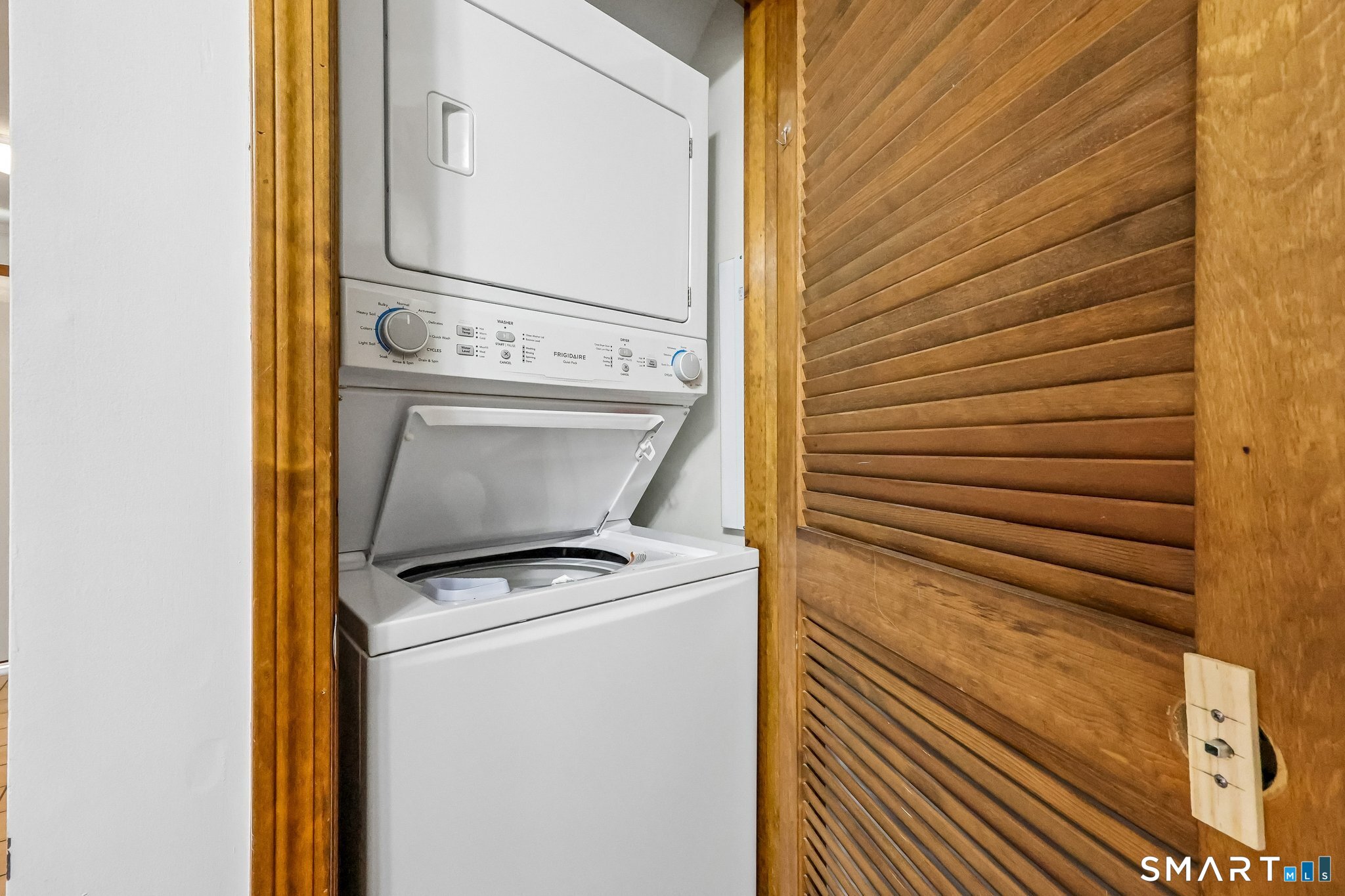 65 Old Route 79, Unit 5 Madison, CT 06443 - Photo 15 of 28 The stackable washer and dryer is located in a closet in the kitchen
