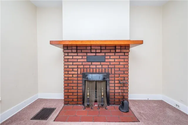 a view of a door with wooden floor