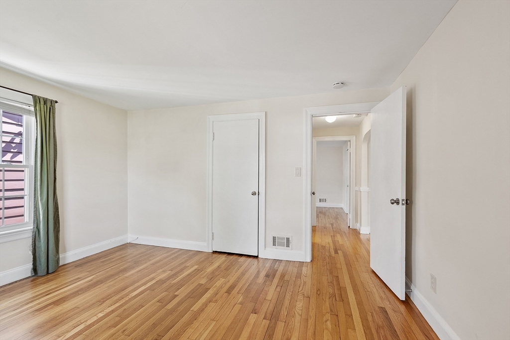 1 Beech Circle Andover, MA 01810 - Photo 17 of 40 a view of a room with wooden floor and a bathroom