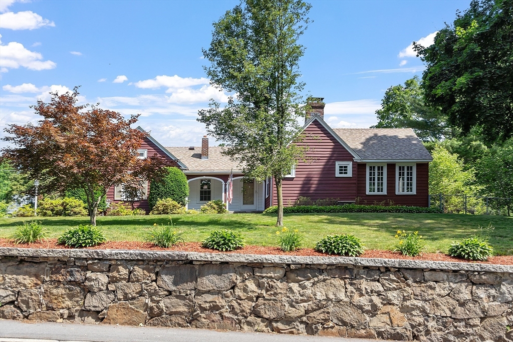 1 Beech Circle Andover, MA 01810 - Photo 2 of 40 a front view of a house with a yard