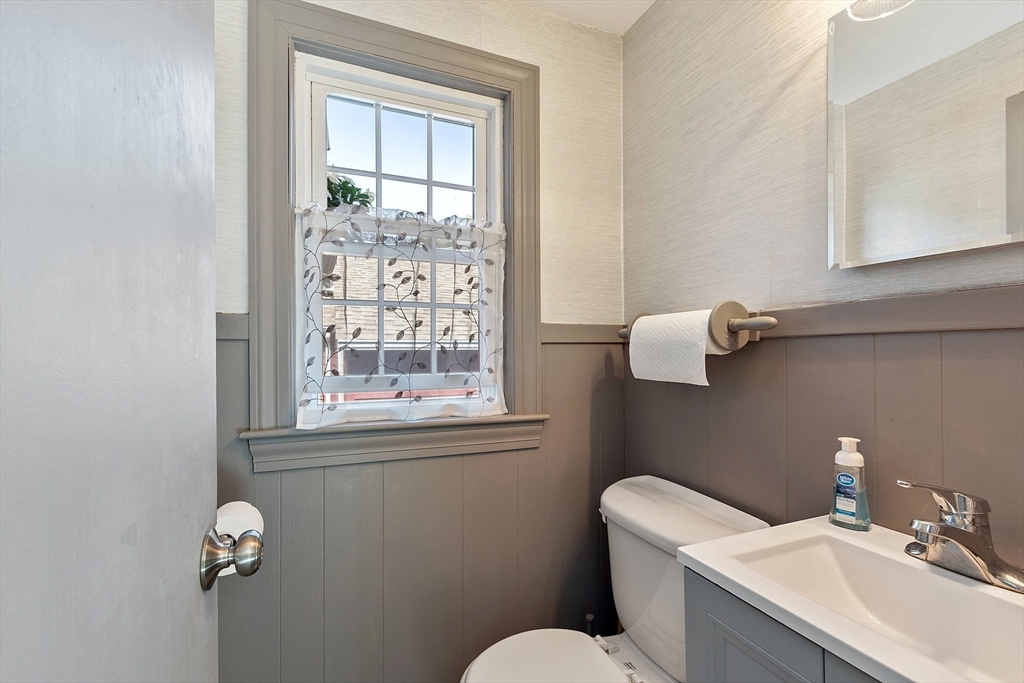 1 Beech Circle Andover, MA 01810 - Photo 24 of 40 a bathroom with a sink mirror and toilet