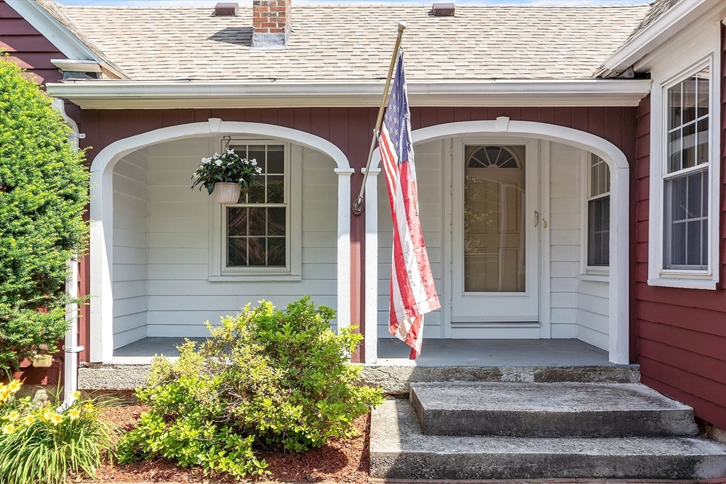 1 Beech Circle Andover, MA 01810 - Photo 34 of 40 a front view of a house with potted plants