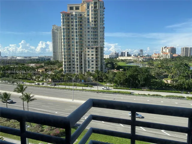 a view of a city with tall buildings