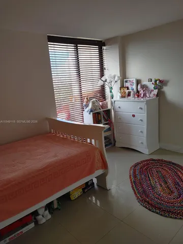 a kitchen with a sink and a stove top oven