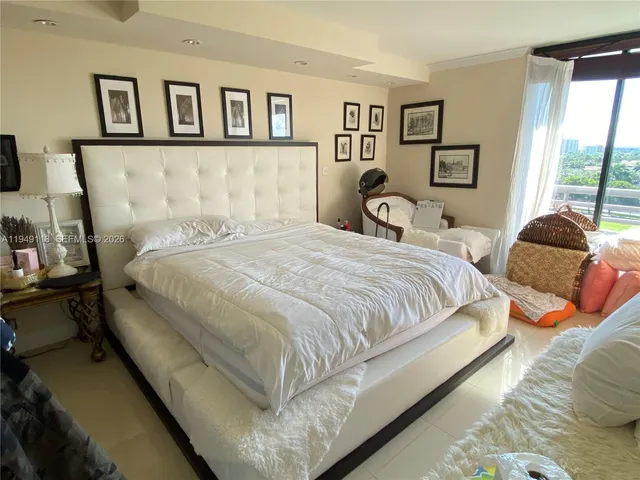 a kitchen with a sink stove and a mirror