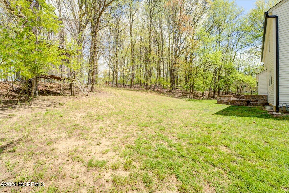 3 Beverly Drive Holmdel, NJ 07733 - Photo 36 of 37 a view of yard with swimming pool