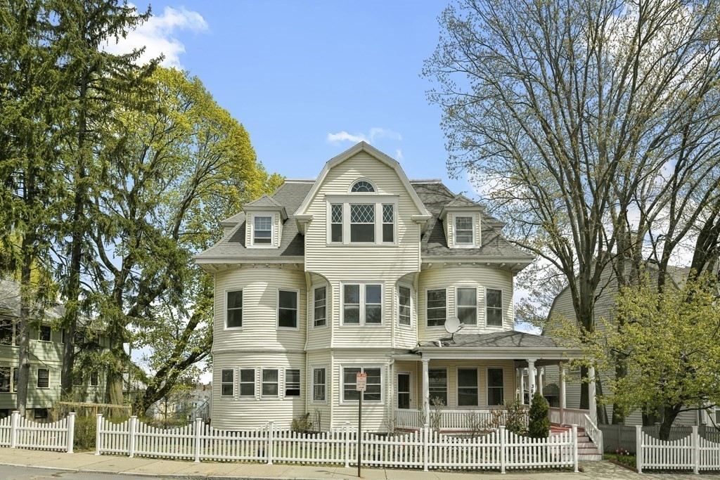384 Arborway Boston, MA 02130 - Photo 1 of 39 a front view of a building with a garden