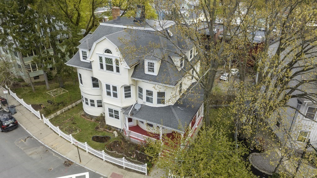 384 Arborway Boston, MA 02130 - Photo 20 of 39 a front view of a house with garden