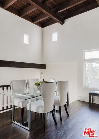 a vase of flowers sitting on a table