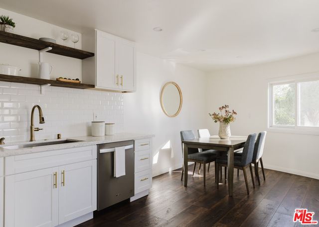 a view of a vase of flowers sitting on a table