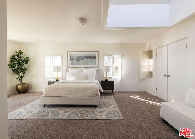 a living room with a large window