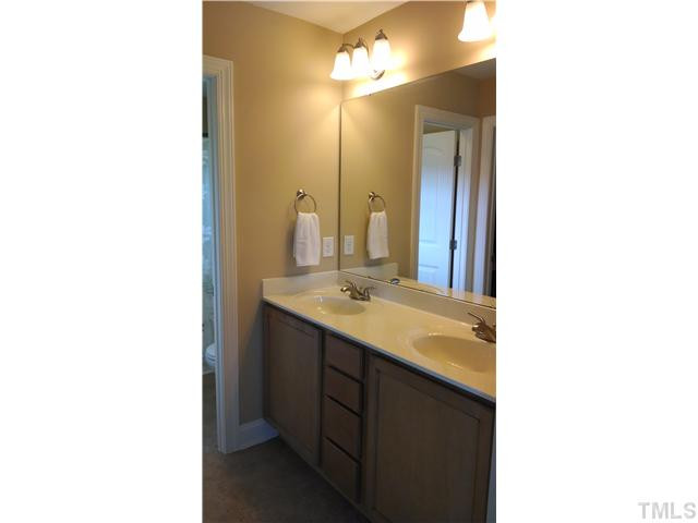 116 Kinloss Way Stem, NC 27581 - Photo 15 of 22 Double vanity in Master bath and just across a large walk in closet