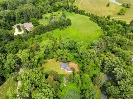 a view of a garden with a lake