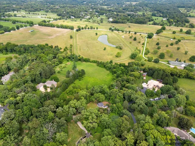 a view of a lake with a yard