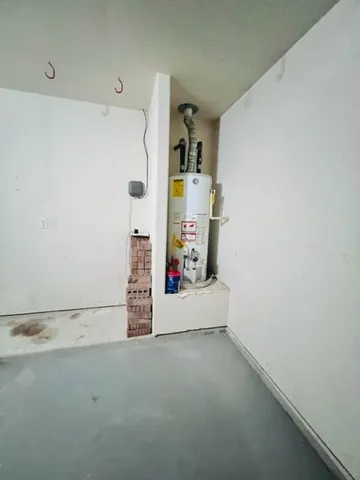 a view of a storage & utility room with washer and dryer